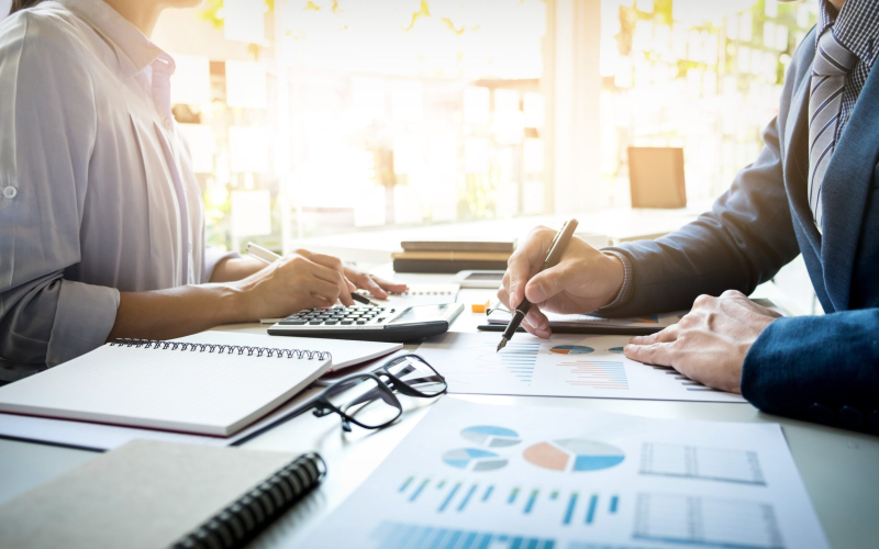 business-man-financial-inspector-secretary-making-report-calculating-checking-balance-internal-revenue-service-inspector-checking-document-audit-concept-min